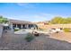 View of the backyard, featuring a pool and spa at 41319 N Panther Creek Ct, Anthem, AZ 85086