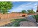 Spacious backyard with a pool, storage shed, and plenty of room for recreation at 4736 W Marconi Ave, Glendale, AZ 85306