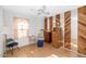 Bedroom with wood floors, a dresser, and a chair at 4736 W Marconi Ave, Glendale, AZ 85306