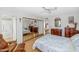 Bedroom with mirrored closet doors and ensuite bathroom access at 4736 W Marconi Ave, Glendale, AZ 85306