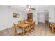 Bright dining room with wooden table, chairs, and hutch at 4736 W Marconi Ave, Glendale, AZ 85306