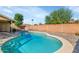 Inviting kidney-shaped pool perfect for summer fun at 4736 W Marconi Ave, Glendale, AZ 85306