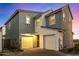 Two-story home with gray siding, white trim, and a two-car garage at 4746 S Ferric --, Mesa, AZ 85212