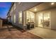 Home exterior view at dusk, showing patio and grill at 4746 S Ferric --, Mesa, AZ 85212