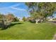 Landscaped community lawn with a gazebo at 619 E Jensen St # 75, Mesa, AZ 85203