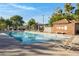 Inviting community pool with lounge chairs at 619 E Jensen St # 75, Mesa, AZ 85203