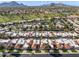 Aerial view of community with mountain views and lush landscaping at 6620 N 79Th Pl, Scottsdale, AZ 85250