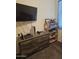 Bedroom with TV, dresser, and shelving at 9505 E Silo Cir, Florence, AZ 85132