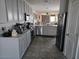 Modern kitchen with gray cabinets, stainless steel appliances at 9505 E Silo Cir, Florence, AZ 85132