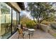 Relaxing patio with seating area, offering a tranquil outdoor space at 10384 E Loving Tree Ln, Scottsdale, AZ 85262