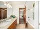 Bathroom with a view of the pool from the vanity at 1055 N Miller St, Mesa, AZ 85203