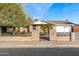 Well-maintained single-story home with driveway at 1055 N Miller St, Mesa, AZ 85203