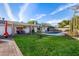 Spacious patio with seating and access to backyard at 1055 N Miller St, Mesa, AZ 85203