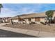 Single-story home with tile roof and desert landscaping at 15008 W Greystone Dr, Sun City West, AZ 85375