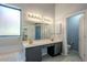 Elegant bathroom with dual vanity, marble bathtub, and mosaic tile floor at 15110 E Palomino Blvd, Fountain Hills, AZ 85268