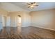 Spacious bedroom with vaulted ceiling, ceiling fan, and wood-look tile flooring at 15110 E Palomino Blvd, Fountain Hills, AZ 85268