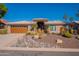 Single-story home with desert landscaping and a two-car garage at 15110 E Palomino Blvd, Fountain Hills, AZ 85268