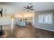 Living room with wood-look tile floors and a fireplace at 15110 E Palomino Blvd, Fountain Hills, AZ 85268