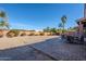 Large brick paved patio perfect for outdoor dining and entertaining, adjacent to a gravel backyard at 15110 E Palomino Blvd, Fountain Hills, AZ 85268