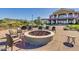 Relaxing community fire pit with seating at 18035 W Muirwood Dr, Goodyear, AZ 85338