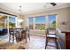 Bright breakfast nook with golf course views and patio access at 29127 N 129Th Ave, Peoria, AZ 85383