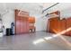 Spacious garage with ample storage and overhead shelving at 29127 N 129Th Ave, Peoria, AZ 85383