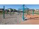 Playground with climbing ropes and a circular play area at 34504 N Timberlake Manor --, San Tan Valley, AZ 85144