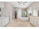 Elegant bathroom with a large soaking tub and double vanity at 4527 N 29Th Way, Phoenix, AZ 85016