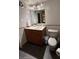 Clean bathroom with single sink vanity and toilet at 6125 E Indian School Rd # 164, Scottsdale, AZ 85251
