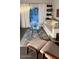 Bright living room with comfy seating and access to patio at 6125 E Indian School Rd # 164, Scottsdale, AZ 85251