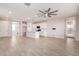 Bright living room with tile floors and ceiling fan at 678 N Bay Dr, Gilbert, AZ 85233