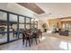 Bright dining room with a mirrored wall and a modern chandelier at 6940 E Cochise Rd # 1007, Paradise Valley, AZ 85253