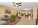 Open living room and dining area with tile floors at 713 S 81St Pl, Mesa, AZ 85208