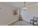 Cozy dining area with tile floors and a chandelier at 8260 E Arabian Trl # 151, Scottsdale, AZ 85258