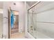Bathroom with a shower/tub combo, and access to another bathroom at 9840 N 111Th Pl, Scottsdale, AZ 85259