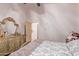 Bedroom with dresser and a view into another room at 9840 N 111Th Pl, Scottsdale, AZ 85259