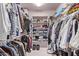 Spacious walk-in closet with ample shelving and hanging space at 9840 N 111Th Pl, Scottsdale, AZ 85259
