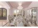 Formal dining room with ornate chairs and a crystal chandelier at 9840 N 111Th Pl, Scottsdale, AZ 85259
