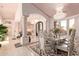Elegant dining room features a large table and stunning chandelier at 9840 N 111Th Pl, Scottsdale, AZ 85259