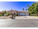 Beautiful home exterior with a three-car garage at 9840 N 111Th Pl, Scottsdale, AZ 85259