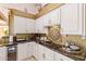 Spacious kitchen with granite countertops and custom backsplash at 9840 N 111Th Pl, Scottsdale, AZ 85259