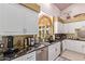 Well-equipped kitchen with a large sink and abundant counter space at 9840 N 111Th Pl, Scottsdale, AZ 85259