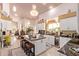 Gourmet kitchen featuring granite island, modern appliances, and custom cabinetry at 9840 N 111Th Pl, Scottsdale, AZ 85259