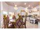 Bright kitchen with an island, custom cabinetry, and high-end appliances at 9840 N 111Th Pl, Scottsdale, AZ 85259
