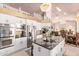 Island kitchen with stainless steel appliances and granite countertops at 9840 N 111Th Pl, Scottsdale, AZ 85259
