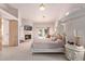 Main bedroom with fireplace, private access to pool, and large TV at 9840 N 111Th Pl, Scottsdale, AZ 85259
