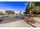 Residential street with palm trees and desert landscaping at 9840 N 111Th Pl, Scottsdale, AZ 85259