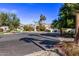 Residential street view, showcasing a neighborhood with palm trees and desert landscaping at 9840 N 111Th Pl, Scottsdale, AZ 85259