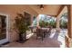 Covered patio with dining area, ideal for outdoor meals at 9840 N 111Th Pl, Scottsdale, AZ 85259