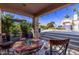 Relaxing patio with seating and views of the pool area at 9840 N 111Th Pl, Scottsdale, AZ 85259